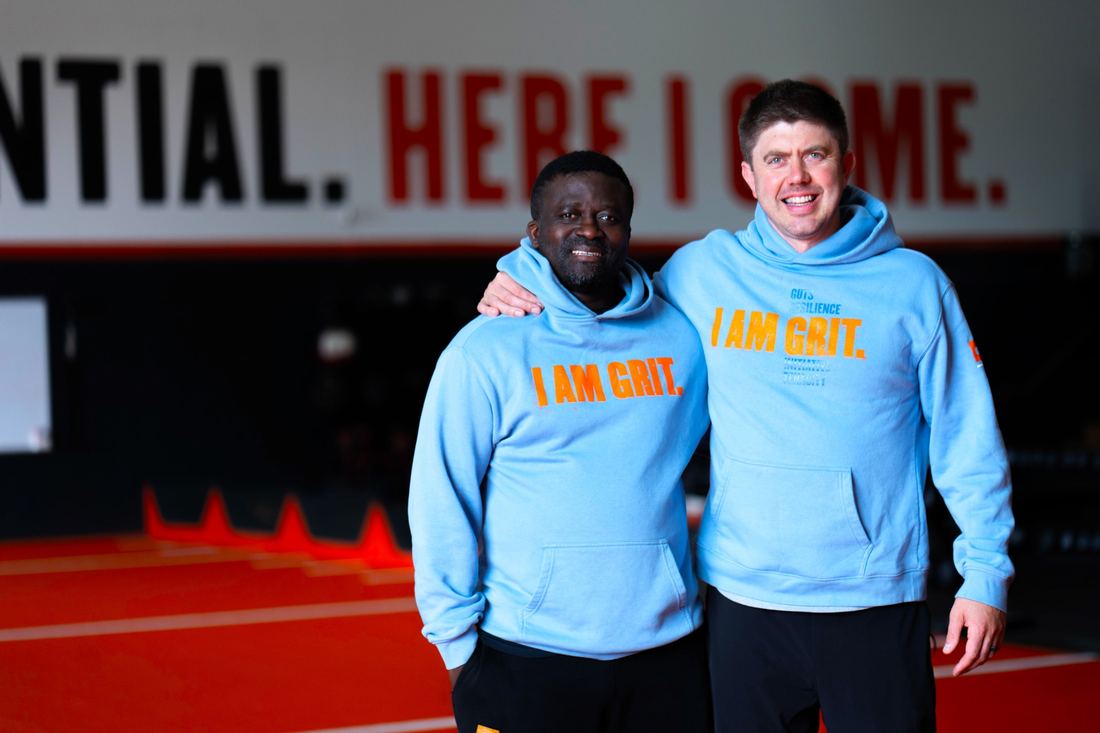 Two Gritworks coaches in I AM GRIT hoodies