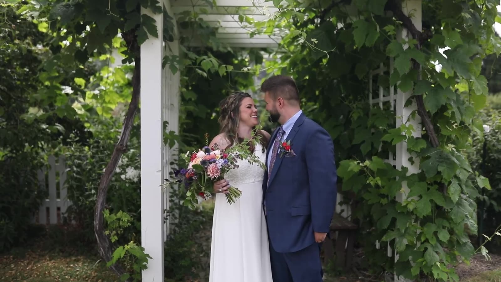 Erin and Brandt photographed on their wedding day, from the Suubi Media wedding film.