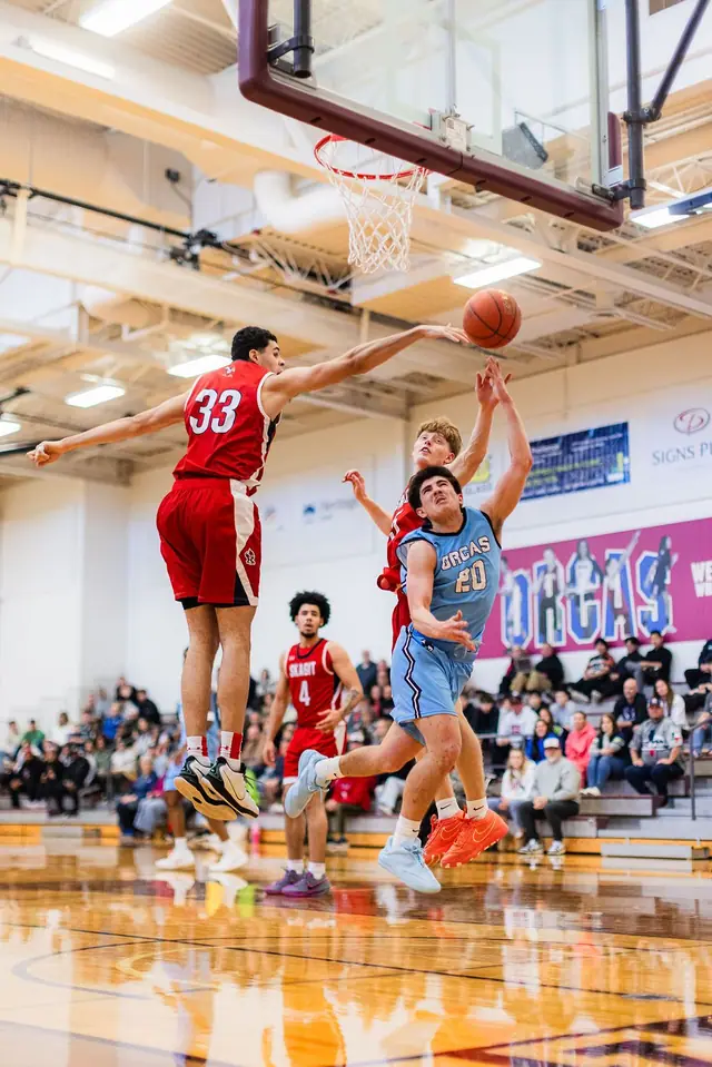 Whatcom Community College basketball player driving to the hoop