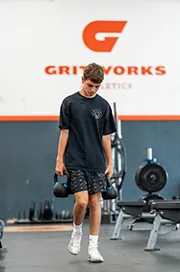 A man walks through the Gritworks gym