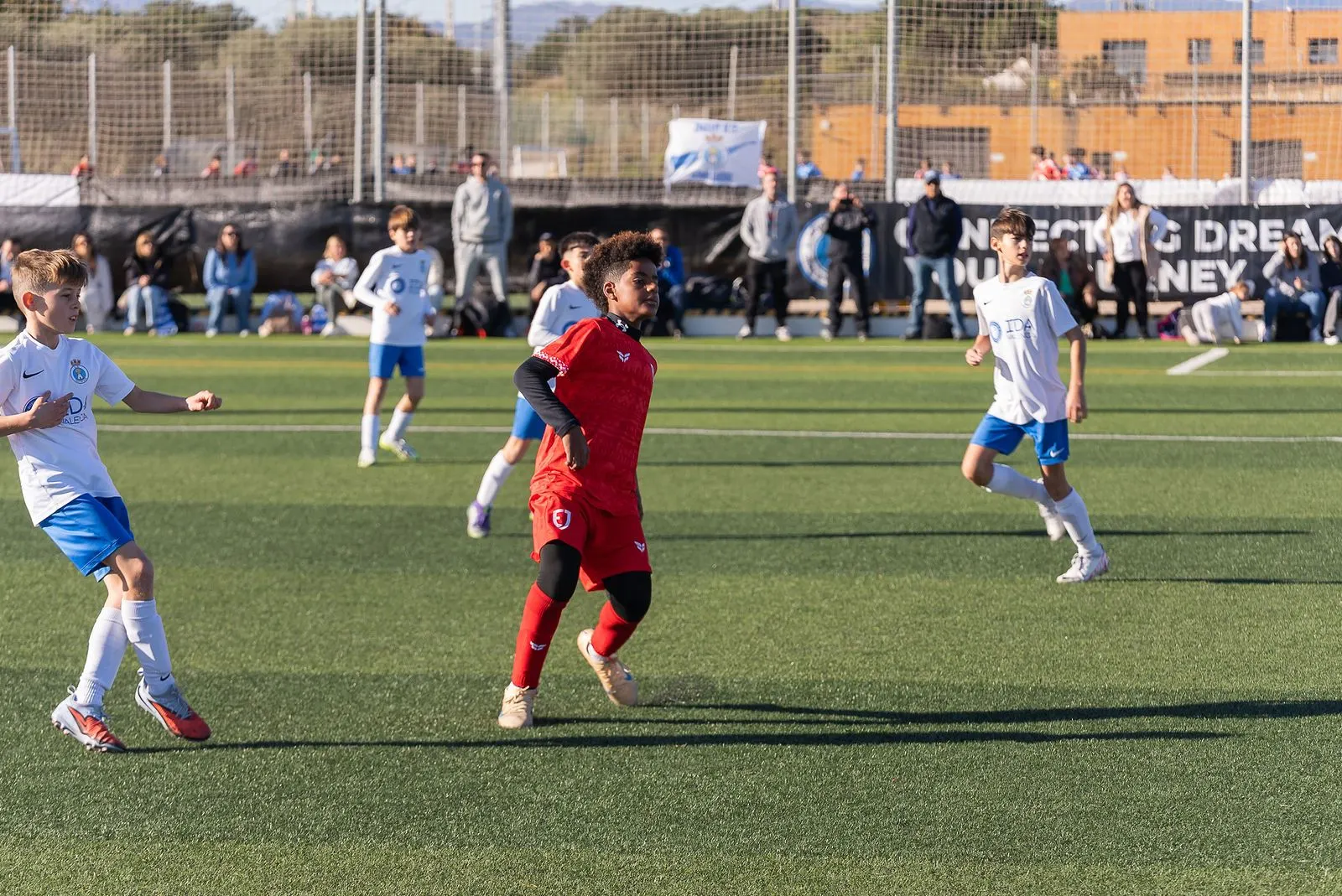 Boys match action in Spain