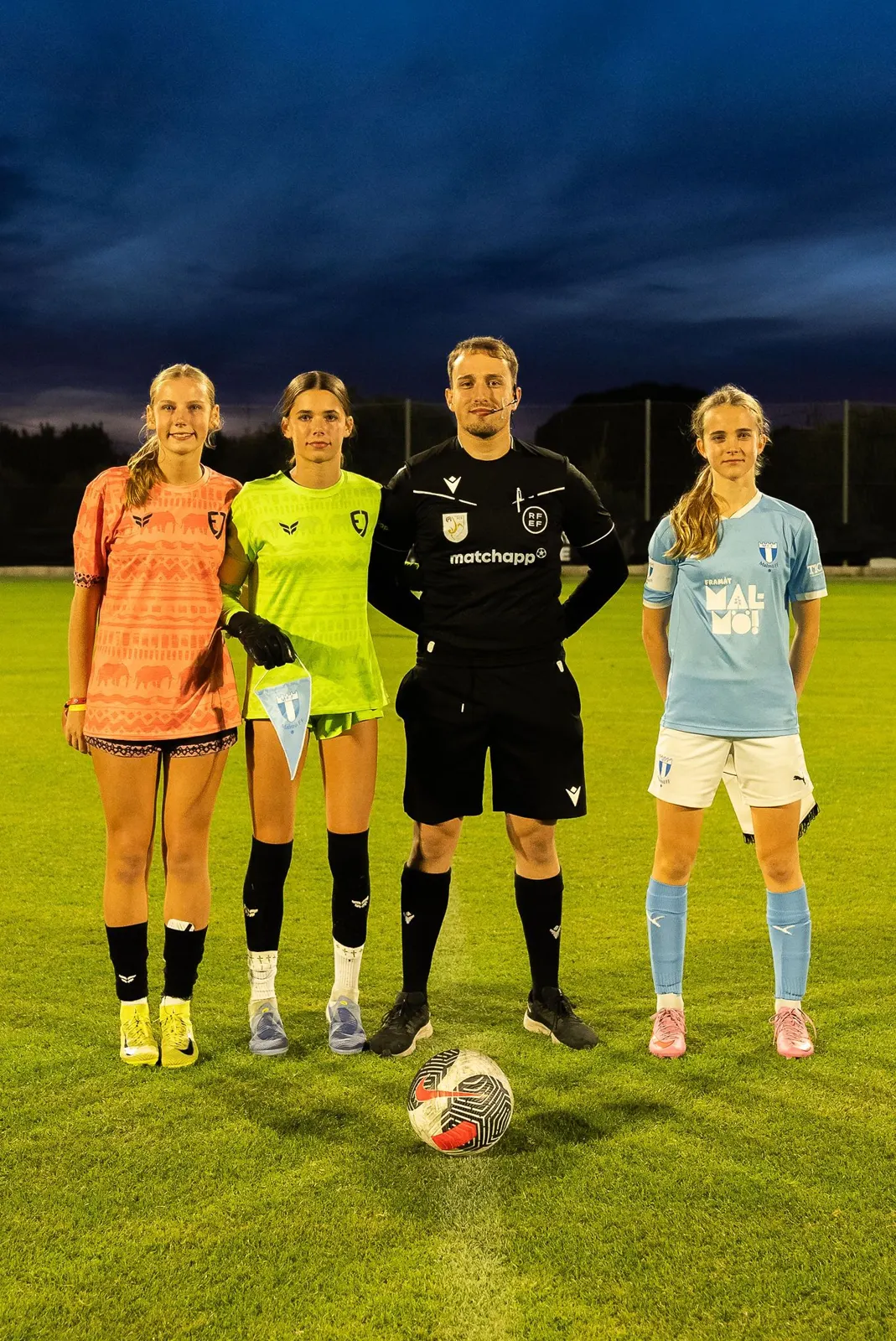 Girls team under the lights